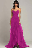 Vestido negro con volantes fruncidos