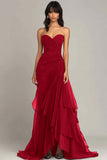 Vestido negro con volantes fruncidos
