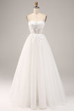 Vestido de novia de tul con hombros descubiertos y apliques
