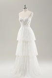 Vestido de novia largo con corsé sin tirantes blanco escalonado