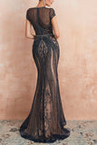Precioso vestido de fiesta burdeos con cuello joya de sirena con abalorios
