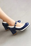 Zapatos negros de punta redonda con correa ajustable