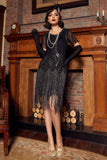 Negro 1920s vestido de lentejuelas con flecos