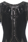 Negro vestido vintage de lentejuelas con flecos