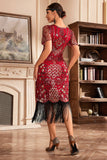 Vestido de Gatsby de la década de 1920 con flecos dorados negros con escote en V y lentejuelas