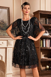 Vestido de lentejuelas negras con mangas de murciélago de la década de 1920