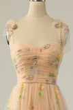 Vestido largo de fiesta bordado con champán