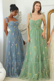 Vestido largo de fiesta bordado con champán