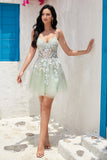 Elegante A Line Navy Spaghetti Straps Homecoming Dress con Criss Cross Back