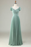 Vestido de dama de honor matcha con volantes