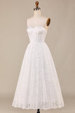Vestido de novia de encaje de marfil Corsé hasta el té