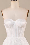 Vestido de novia de encaje de marfil Corsé hasta el té