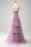 Vestido de fiesta malva con corsé largo evasé de tul con apliques