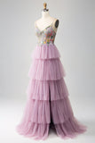 Vestido de fiesta malva con corsé largo evasé de tul con apliques