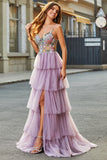 Vestido de fiesta malva con corsé largo evasé de tul con apliques
