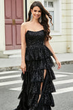 Elegante vestido de fiesta largo de lentejuelas negras sin tirantes de una línea con volantes